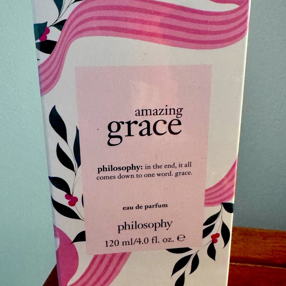 Amazing Grace perfume. 4 oz.   Intact with plastic.